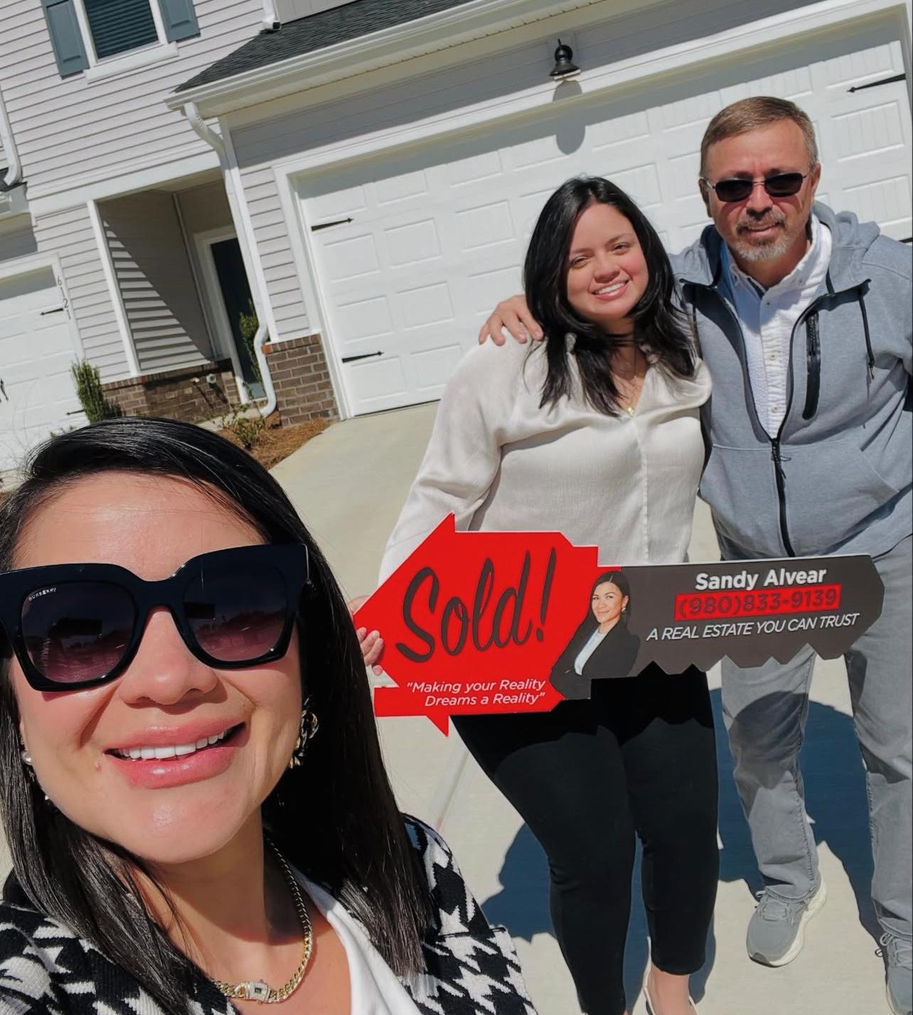 Sandy Alvear sold sign at new construction home